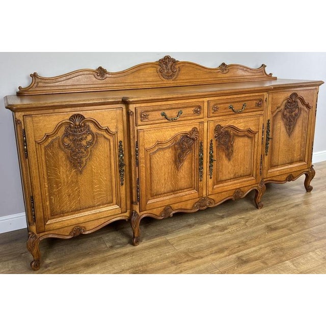 Bring classic French charm into your home with this elegant Vintage French Louis sideboard, beautifully crafted in oak...