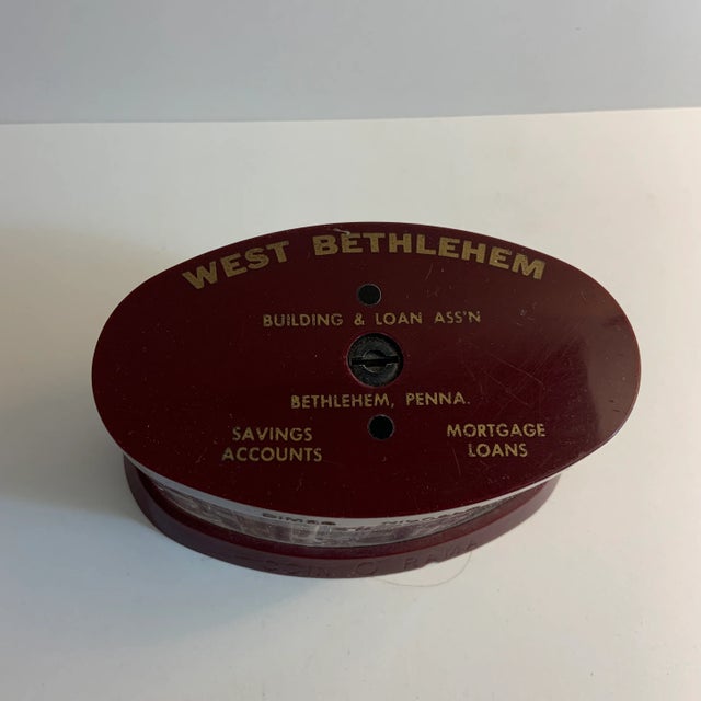 West Bethlehem Building & Loan Savings Bank. Slots for dimes, nickels, halves, and quarters.