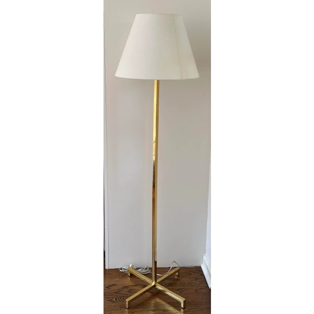 This beautiful brass floor lamp designed by T.H. Robsjohn-Gibbings for Hansen is classic Gibbings– understated, refined,...
