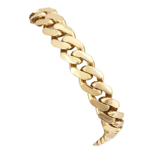 This is a classic style Cuban link chain from Monaco Jewelry, crafted from 14k yellow gold (hollow links) featuring an...
