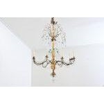 A spectacular and massive 18th century Genovese-style Italian chandelier decorated with transparent and jewel-tone...
