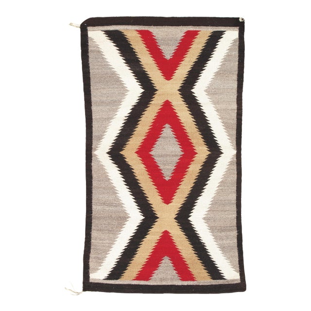 Rhythm of the Four Directions: A Mid-20th Century Navajo Chevron Rug, Handmade For Sale