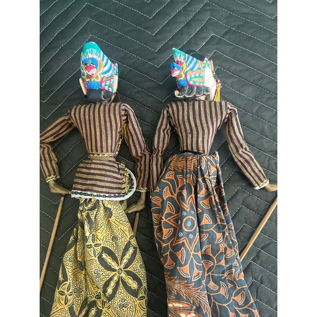 Striking pair of vintage Indonesian Wayang Golek rod puppets, dating approximately to the mid-20th century, circa...