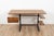 Vintage writing desk by Marko. The desk is made out of a wooden surface, drawers and storage shelves on a black coated...