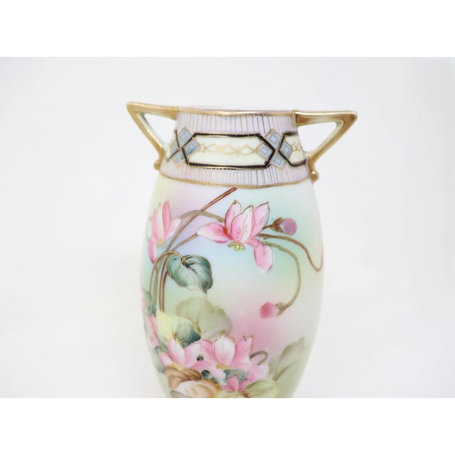 Antique Art Nouveau porcelain vase with hand-painted floral pattern and gold decoration. Made in Japan in the 1900s.
