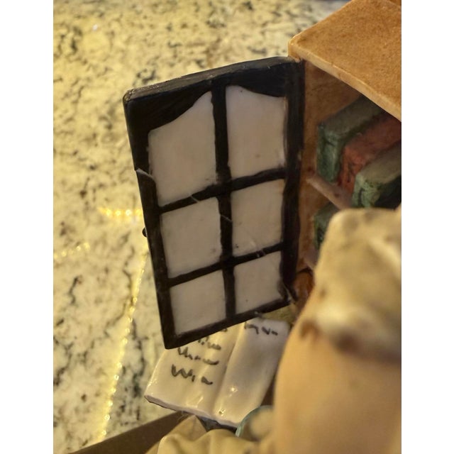 Original Capodimonte Pharmacist. Small piece of door broke off but was repaired. Luciano Cazzola was the artist.