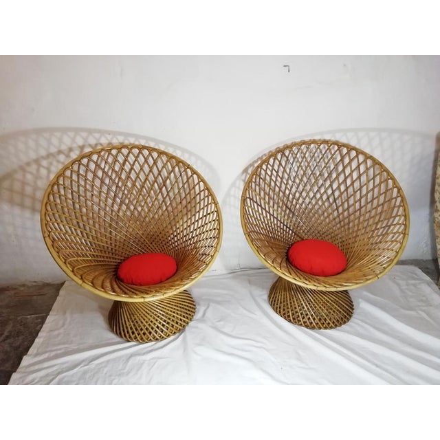 Pair of armchairs in rattan and India rod. Spring model produced by BBB Bonacina on Design by Franca Helg/Franco Albini....
