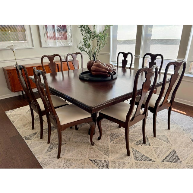 Set of 8 Vintage Queen Anne Style Dining Chairs Elegant solid wood dining chairs featuring classic Queen Anne design with...