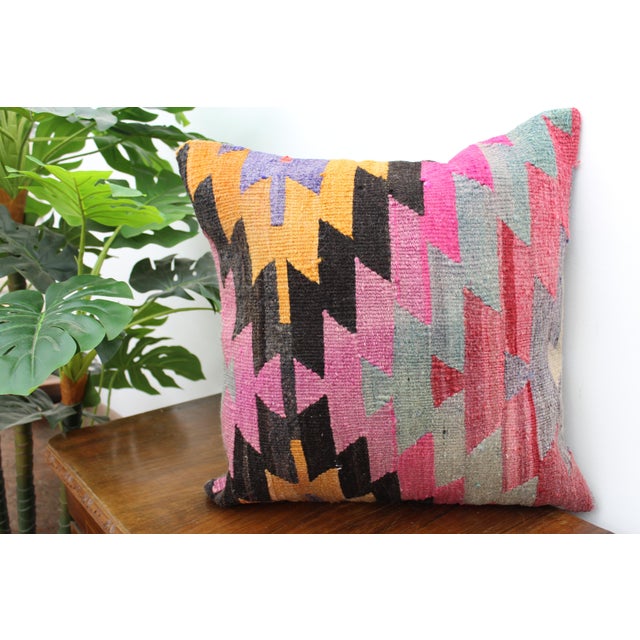 This Turkish pillow cover is made from the highest quality Vintage Kilim in 100% wool on the front. The back is covered in...