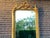 This striking late 20th-century French floor mirror combines full-length functionality with the refined symmetry and...