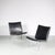 1960s pair of lounge chairs on chrome metal base with black skai upholstery and chrome details, model airport / hans j....