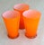 Set of 3 cased glasses in a bright orange. Set of 4 matching yellow glasses and 2 shorter lime green available separately...