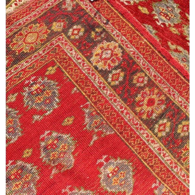 Textile Vintage Turkish Oushak Rug in Rich Red With Allover Floral Rosette Pattern For Sale - Image 7 of 8