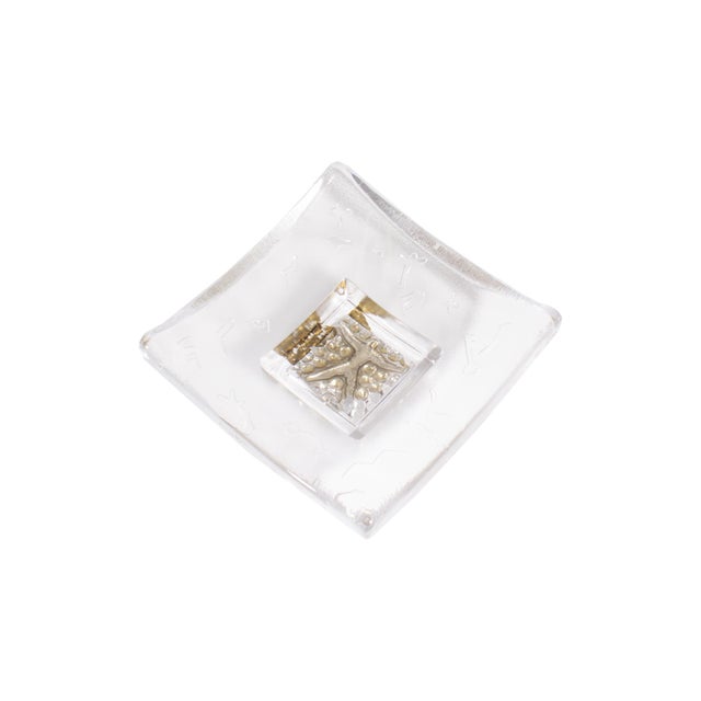 A glass dish from the Domino series designed by the Swedish glass artist Bertil Vallien (born 1938) for Kosta Boda. Square...