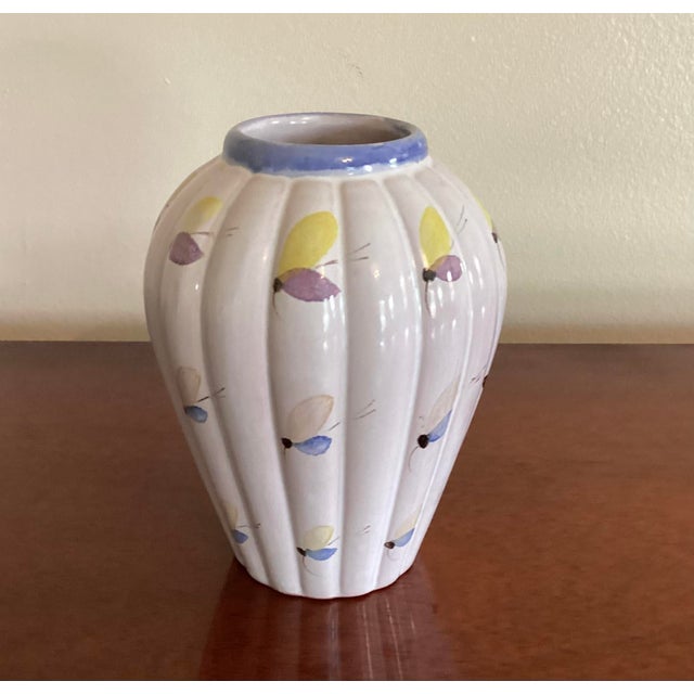 Charming Arabia of Finland red-clay ceramic bud vase, likely terracotta, featuring a softly ribbed form and a hand-painted...