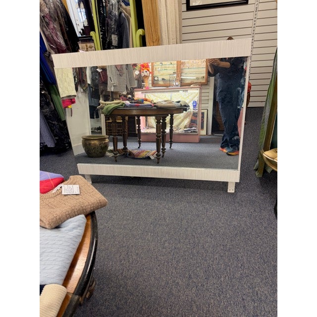 The dresser is comprised of two separate pieces which are placed together to create a long dresser and that is what is...