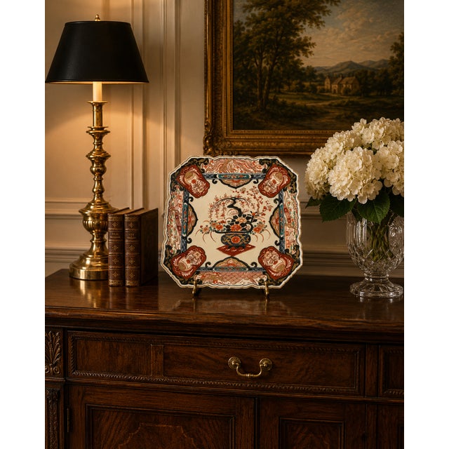 An antique Japanese Imari porcelain charger of excellent decorative quality, richly hand painted in the traditional...