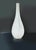 Elegant white and transparent Murano glass vase characterized by a "pear" shape. The set is available as shown in the...