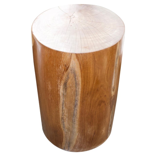 Reclaimed teak wood pedestal with a natural oil finish revealing the beautiful wood grain. Own an Andrianna Shamaris...