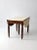 An antique drop-leaf dining table with a classic turned-leg silhouette and beautifully aged character. The wooden table...