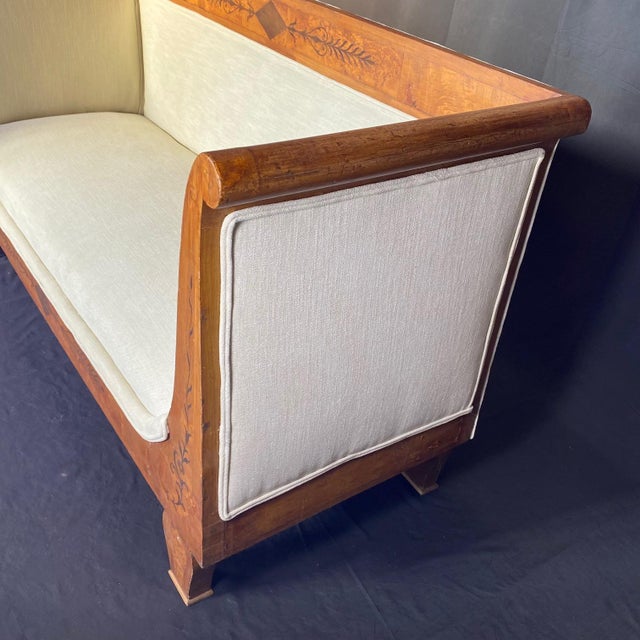 We are pleased to offer you this elegant and truly exceptional French Neoclassical sofa made in the 19th Century....