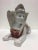 A fabulous artful tabletop accessory or sculpture from Hong Kong, vintage 1960, in the shape of an Egyptian Sphinx having...