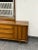 Design Plus Gallery presents a Dresser with Detachable Mirror from the Mid 20th Century by American of Martinsville. The...