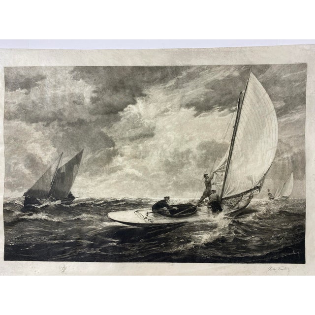 Antique maritime engraving print, circa 1919, depicting sailing vessels navigating a dramatic rough sea beneath a richly...