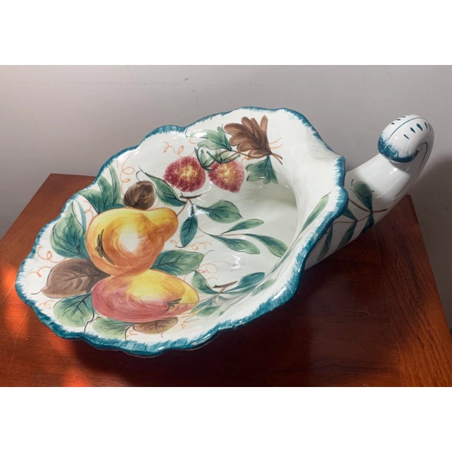 Vintage, hand painted, Majolica pottery Figural cornucopia, centerpiece or decoration, made in Italy. Features a festive...