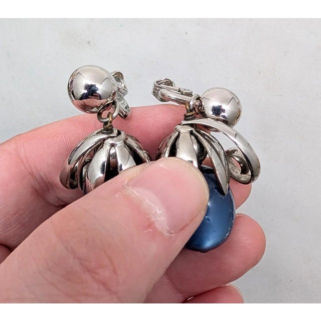 Metal Vintage Signed Napier Cumquat Rhodium Plated Blue Moonglow Resin Drop Clip Earrings-2 Pieces For Sale - Image 7 of 9