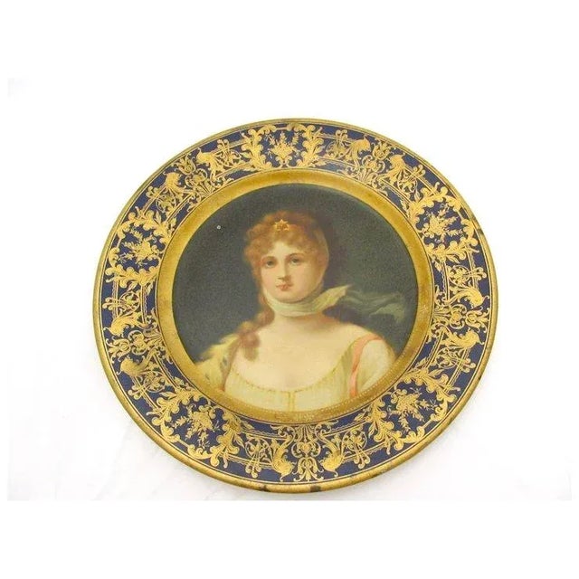 Vienna Art Tin - Woman Wearing Scarf with beautiful hand painted blue/gold design in original condition. 10" D