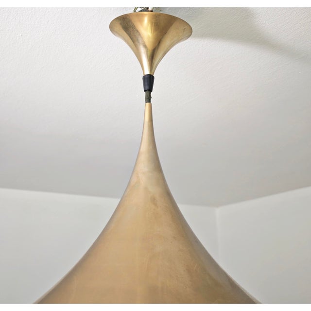 Claus Bonderup & Torsten Thorup for Fog & Mørup, designed in 1968. Pendant lamp in brass and gold-plated metal. This model...
