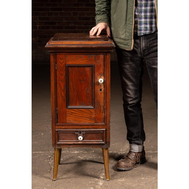 Brown Late 19th Century Early American Oak Cabinet With Tapered Brass-Capped Legs For Sale - Image 8 of 8