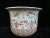 Chinese Qing Dynasty, late 19th century porcelain jardiniere. Hand painted enamel on white porcelain, decorated with...