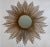 A stellar mid-century modern bronze sunburst mirror with brushed gold. You will love this timeless piece in your home. It...