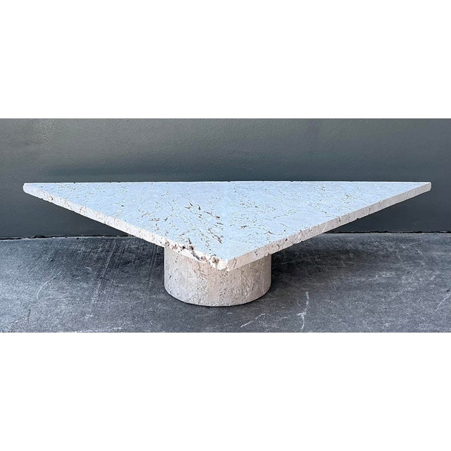 Make a bold architectural statement with this monumental geometric coffee table, a masterclass in Postmodern design....