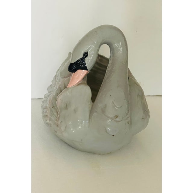 Gorgeous vintage handmade ceramic glazed gray and pink large swan figurine planter.