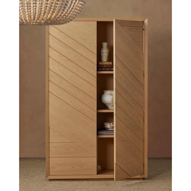 Made of white-oak solids and veneers in a light oak finish, the Margot Natural Oak Storage Chest was inspired by the...
