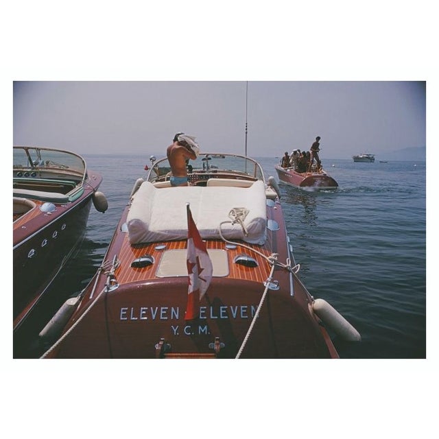 Motorboats In Antibes 1969 Motorboats moored on the coast near the Hotel du Cap-Eden-Roc in Antibes on the French Riviera,...