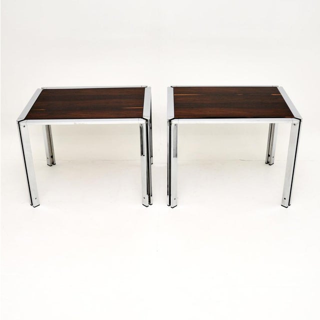 A stunning pair of vintage chrome side tables with inset wooden tops. These were made in Italy, they date from the...