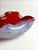 This Murano glass bowl by Alfredo Barbini, produced in Italy during the 1960s, is executed in the sommerso technique, with...