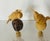 Beautifully carved two bird figurines mounted on brass bases as lamp finials.