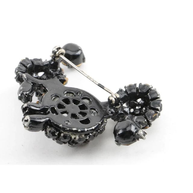This is part of Chairish’s Costume Jewelry assortment. Adorable Jet Bead Poodle Brooch from the 1940s. Various size...