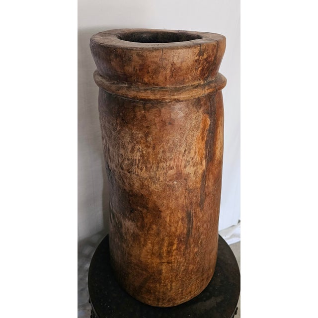 Unique and one of a kind wood carved butter churn pot from North India. Originally used in the villages to store grain...
