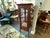 20th century Oak Victorian glass display cabinet. Carved and brass detail, bead trim. Long cabriole legs. Glass door is in...