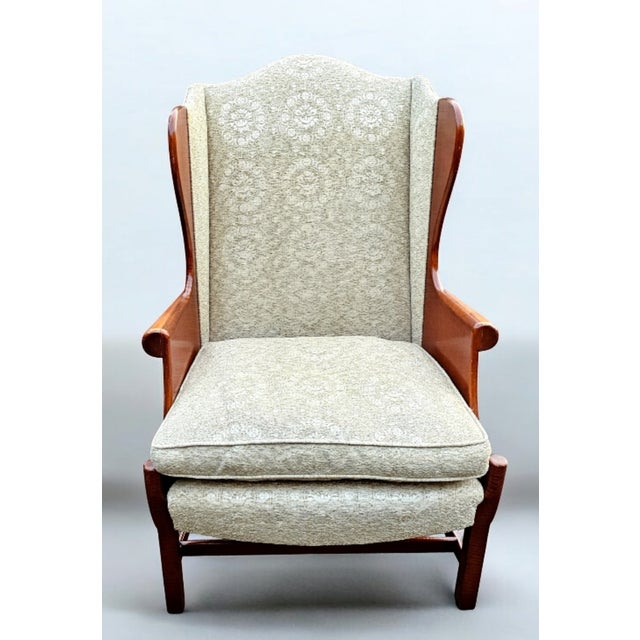 This Vintage Stickley "Connecticut Valley" Wingback Chair is exquisite, with numerous elegant design elements that...