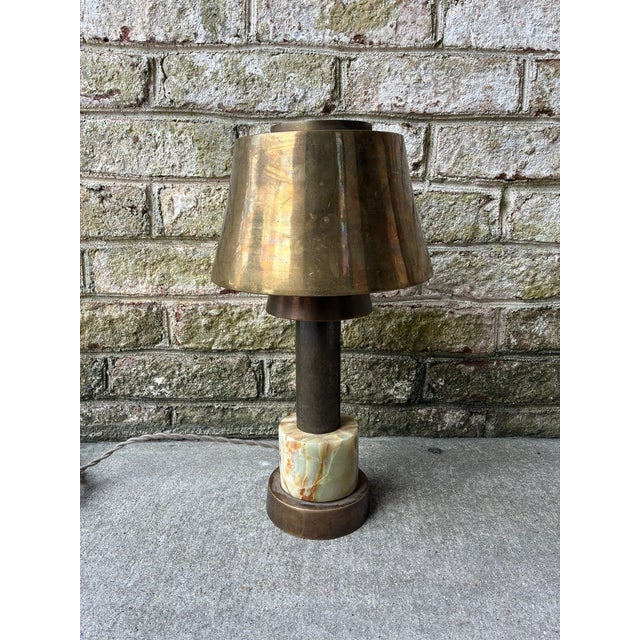 Vintage brass and marble table lamp. This table lamp features a brass shade and stem, both with the perfect patina, which...