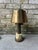 Vintage brass and marble table lamp. This table lamp features a brass shade and stem, both with the perfect patina, which...