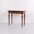 Antique games table crafted in polished mahogany and walnut, dating from the 1860s. The table has a hand-polished finish...