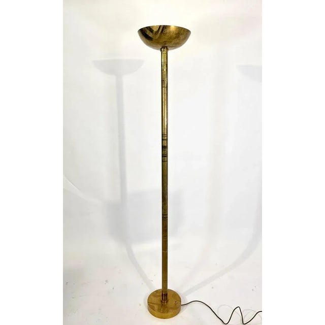 From the 1980s comes this one of a kind floor lamps in full etched brass. This floor lamps received new electric al wires...
